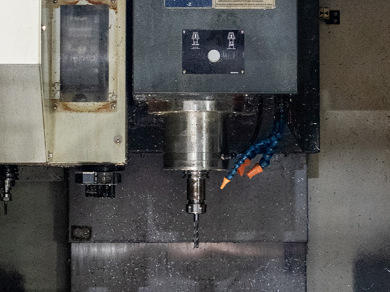 A spindle and cutting tool inside a machining center